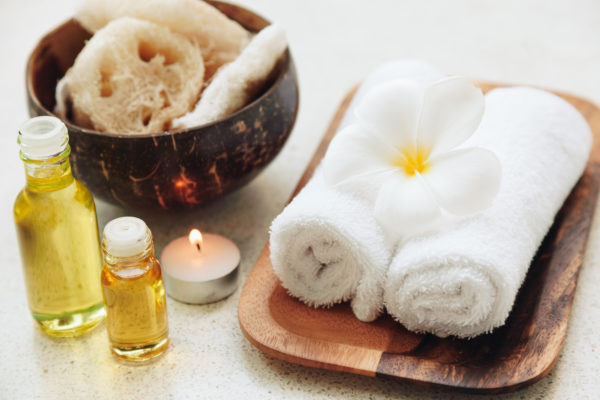 Spa decoration, natural organic bath products on a wooden tray